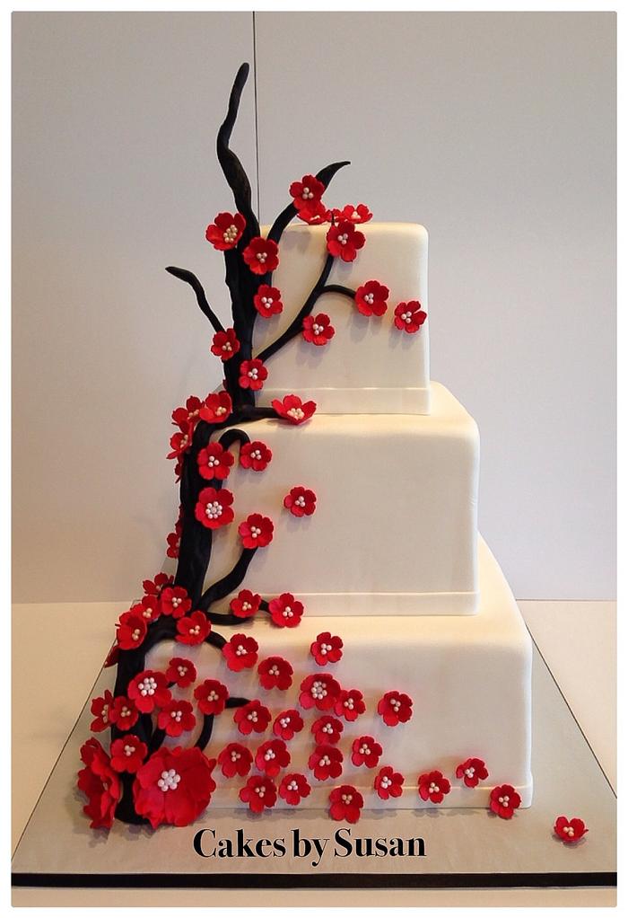 Red sugar blossom wedding cake