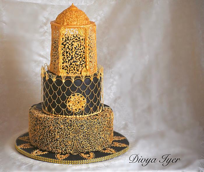 Royal icing black and gold wedding cake 