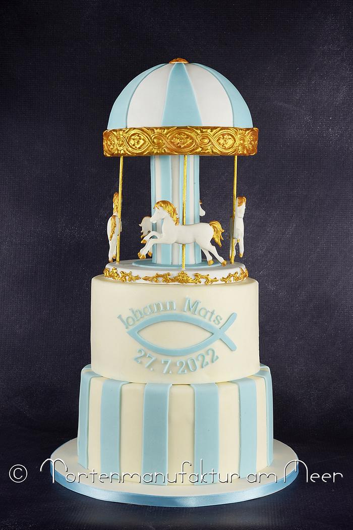 Christening cake with horse carousel