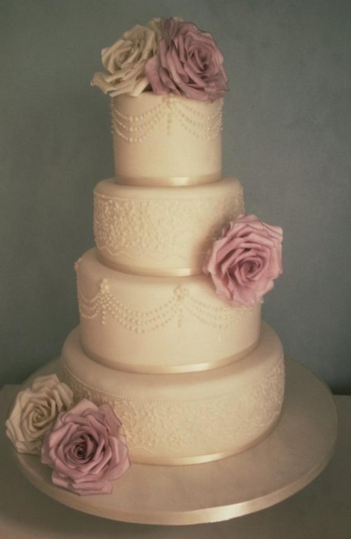 Ivory and dusky pink rose wedding cake