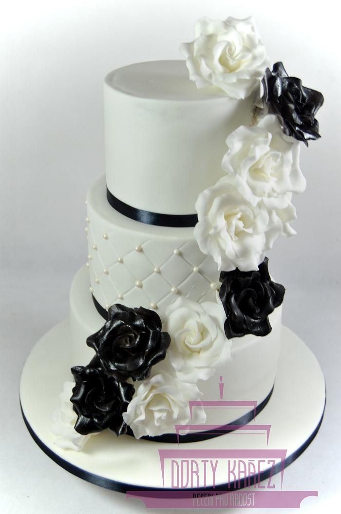 Wedding cake with black and white roses