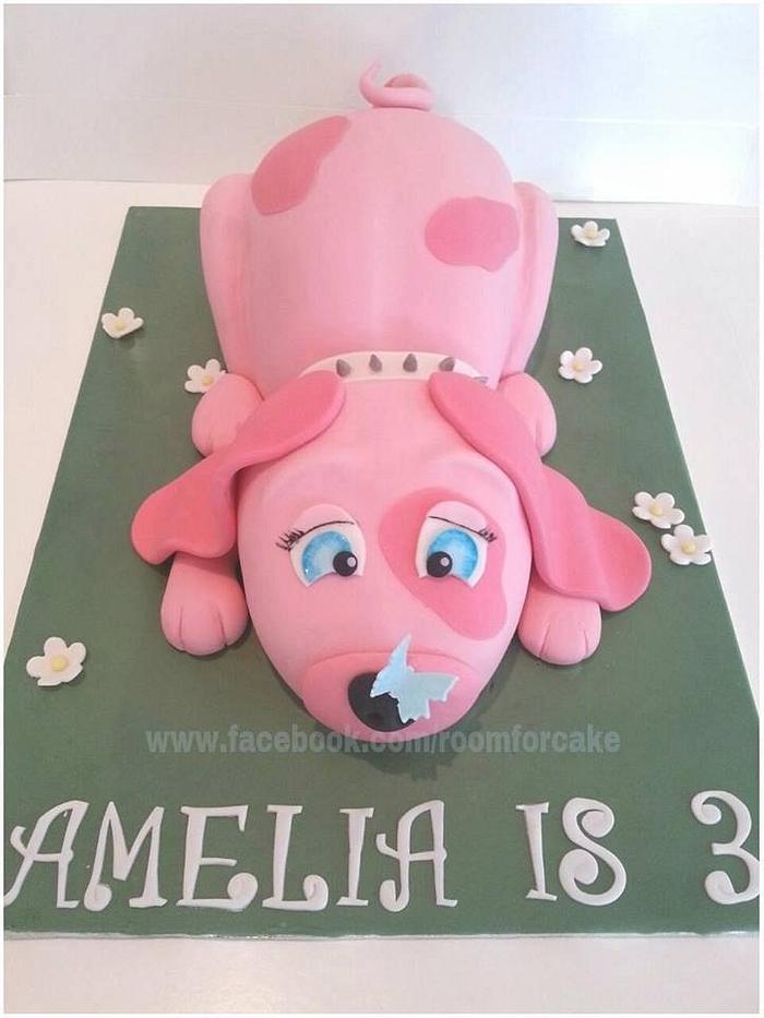 Pink puppy birthday cake