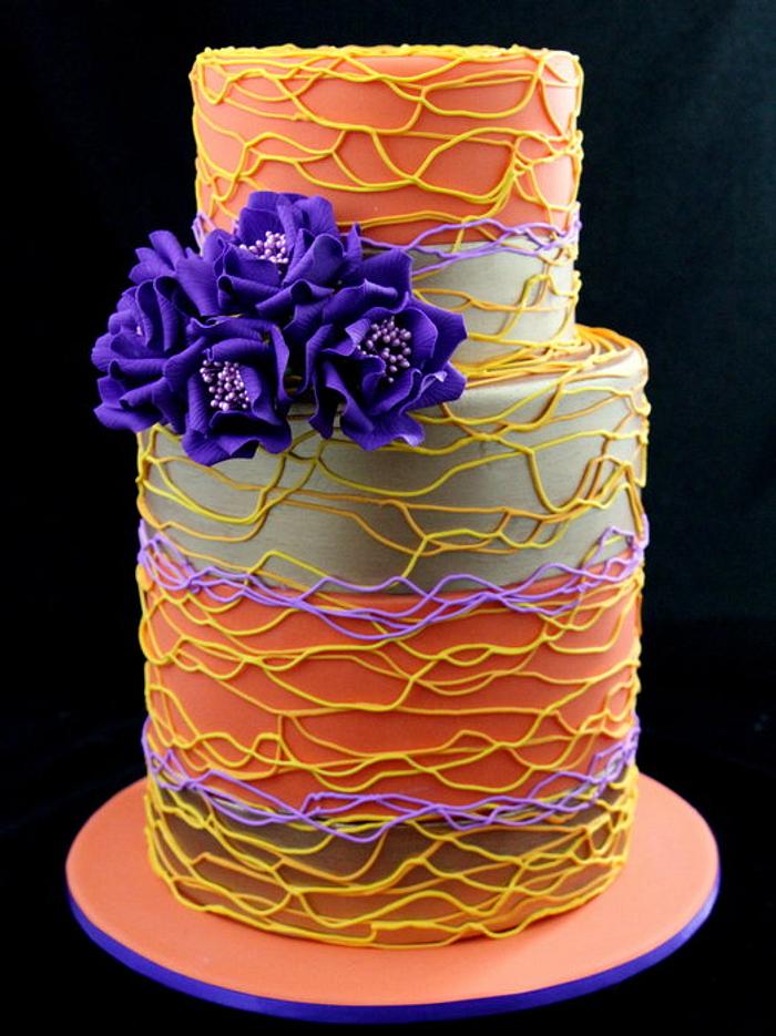 spiral piping cake with purple roses