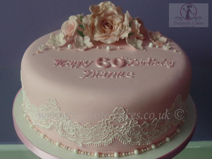 Pink rose and lace cake for a 60th birthday.