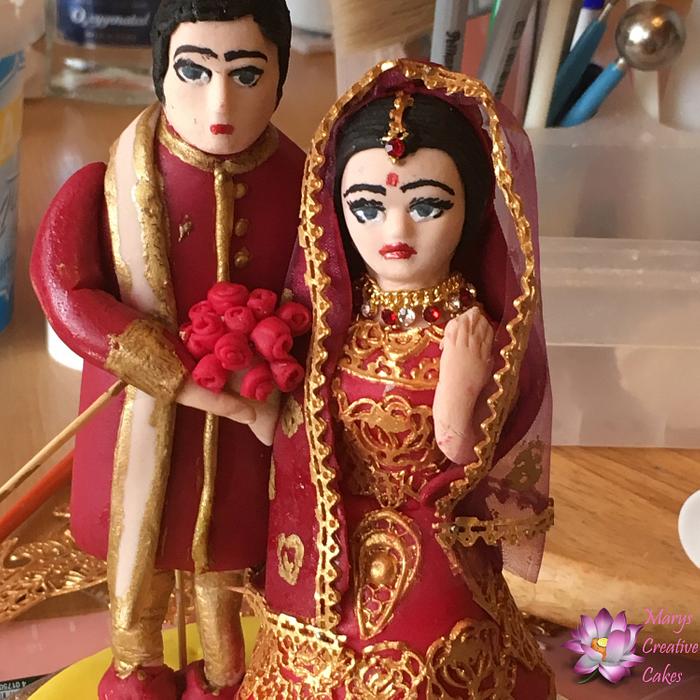 Indian style wedding cake topper