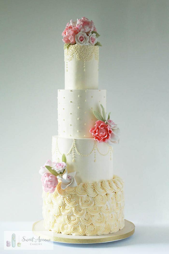 Vintage buttercream wedding cake with flowers