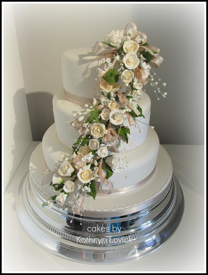 cascading ivory and champagne roses