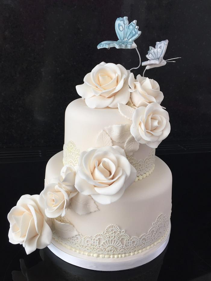 Butterflies and roses wedding cake 
