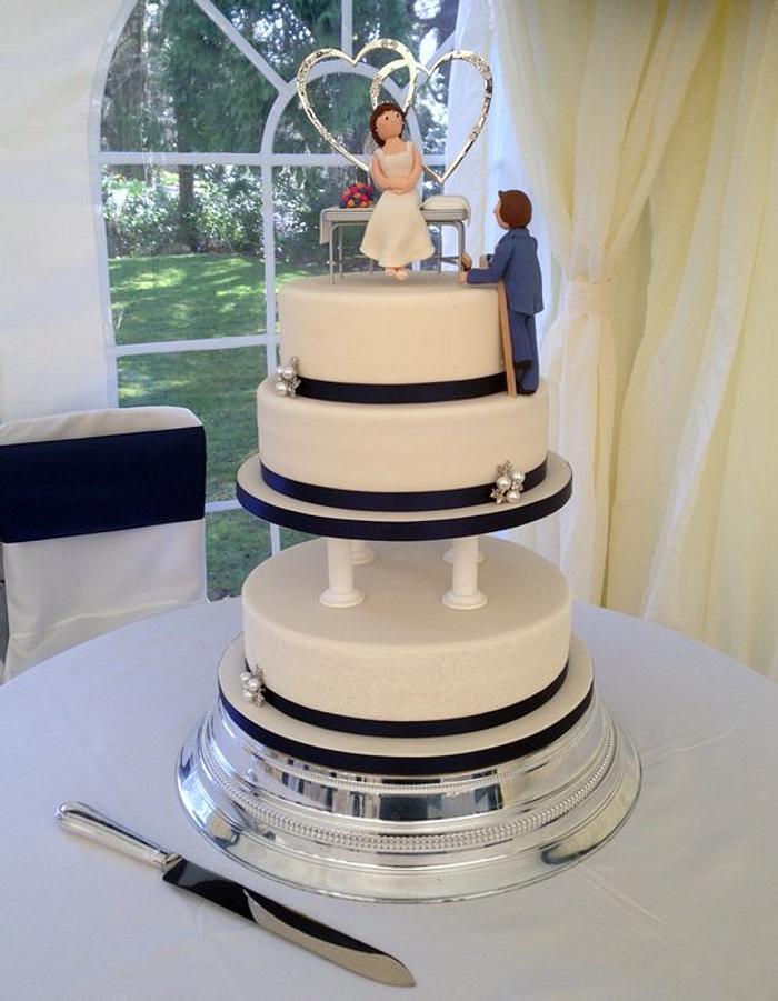 Elegant Wedding cake for a painter & decorator and his beautician bride 