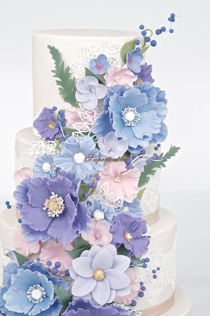 4 tiers wedding cake in pastel tones