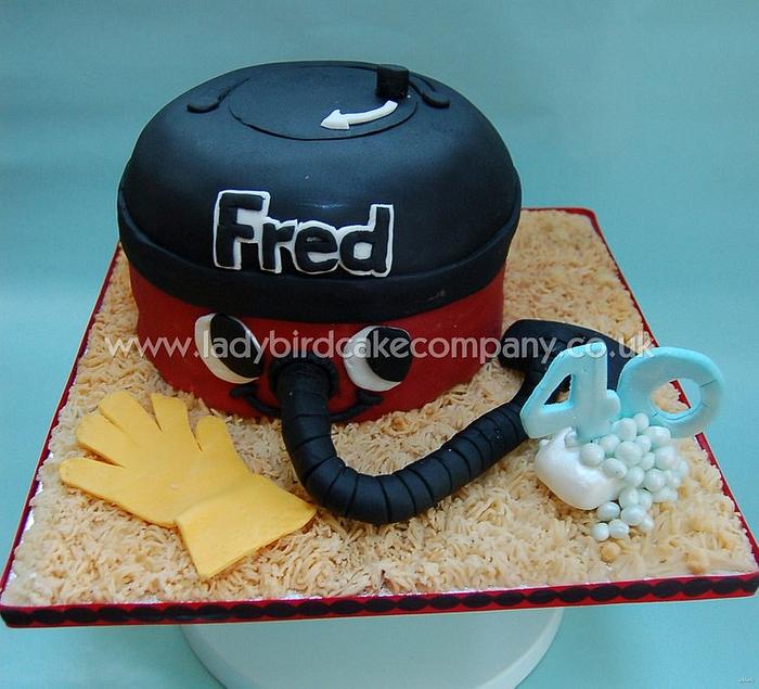 Henry the Hoover cleaning cake