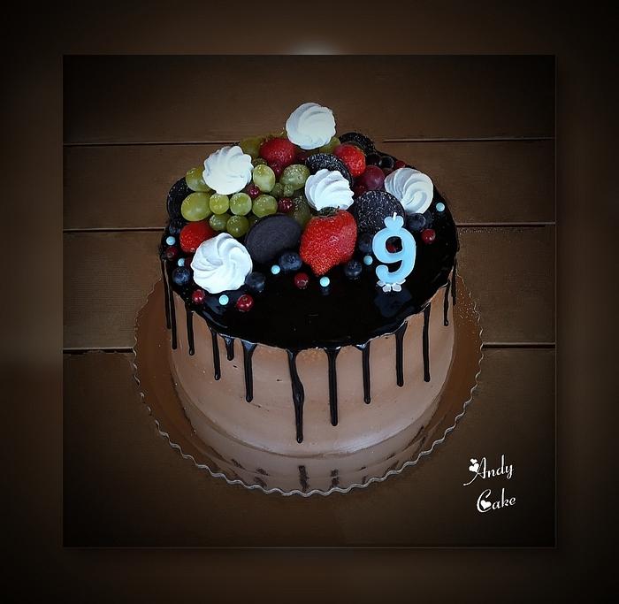 Chocolate birthday cake with fruits