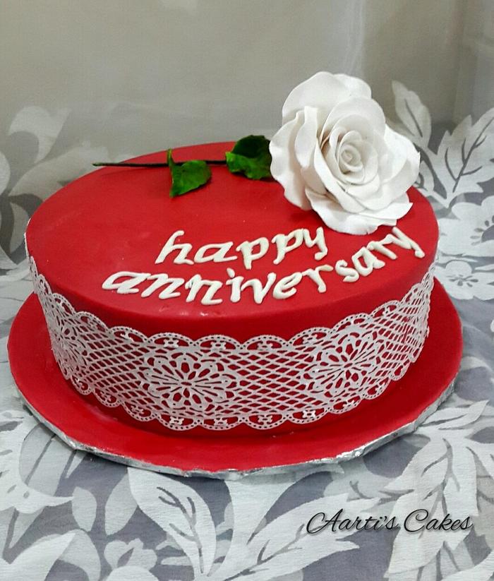 Red n white anniversary cake