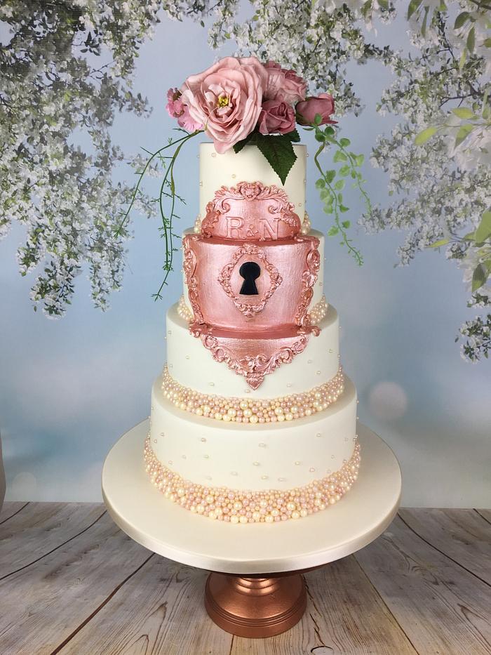 Fairytale rose gold lock wedding cake 