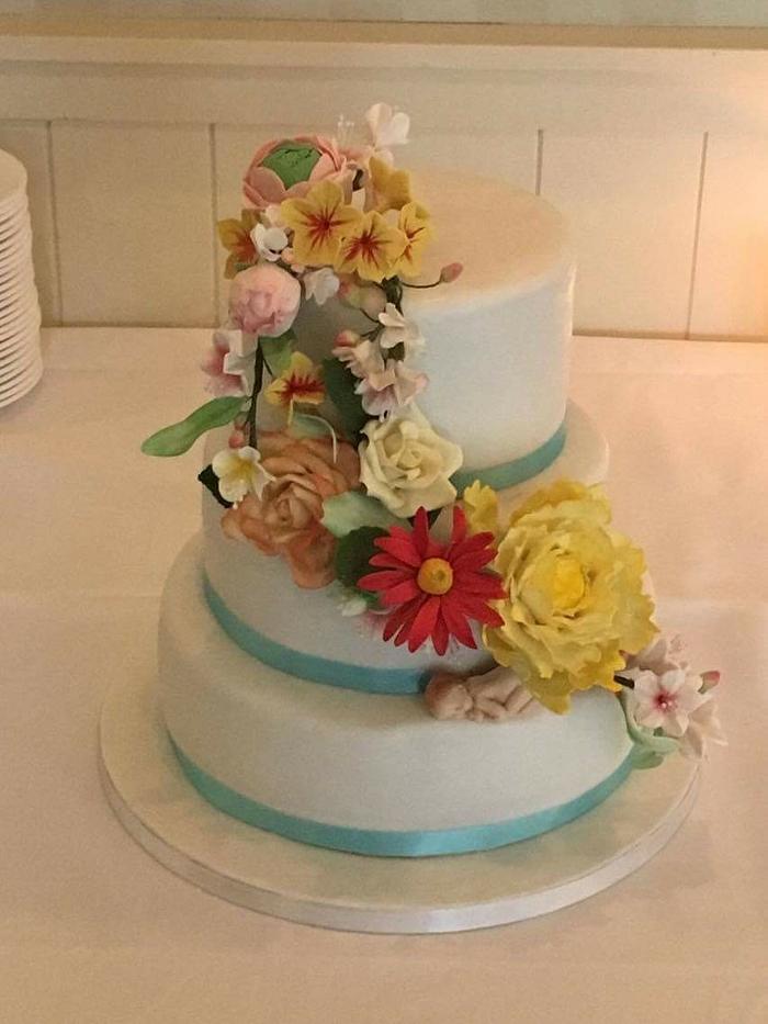 Wedding cake with edible sugar flowers