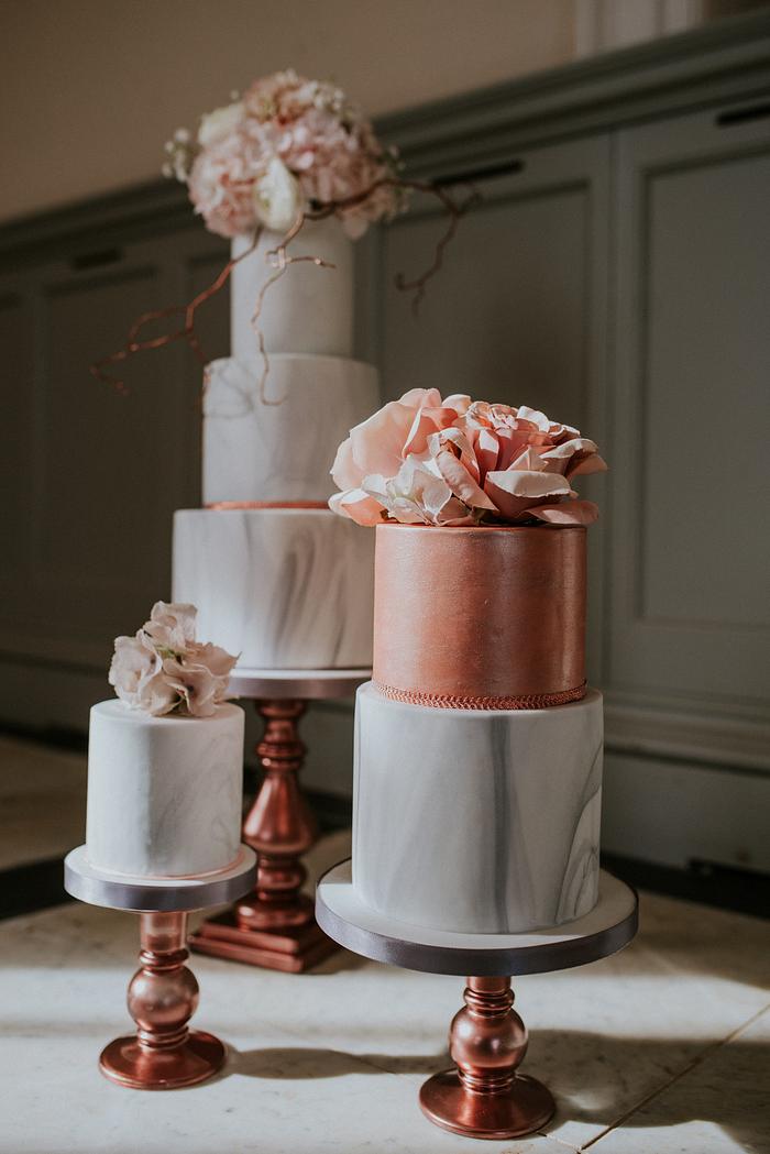 Marble wedding cake with blush and copper 