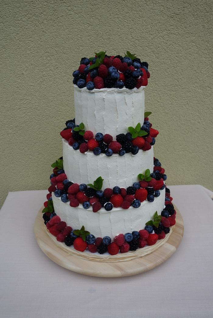 Wedding cake with butter cream and fruits