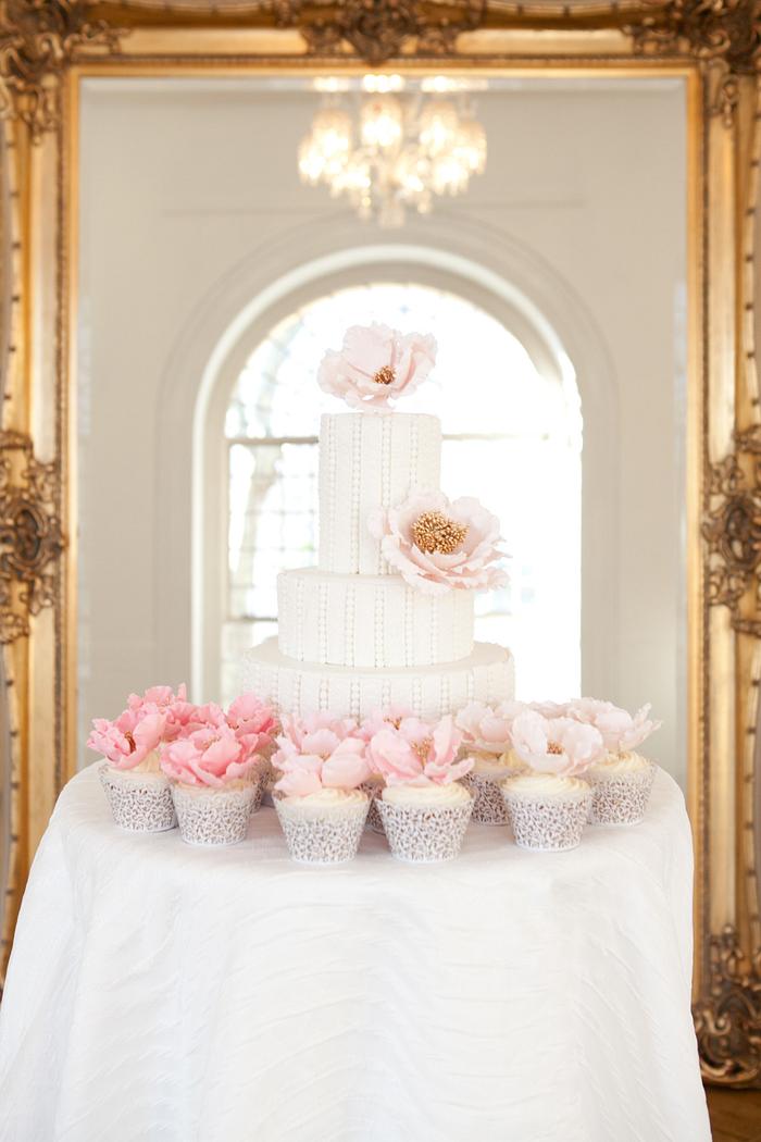 Pearl beaded cake with matching pink ombre cupcaks