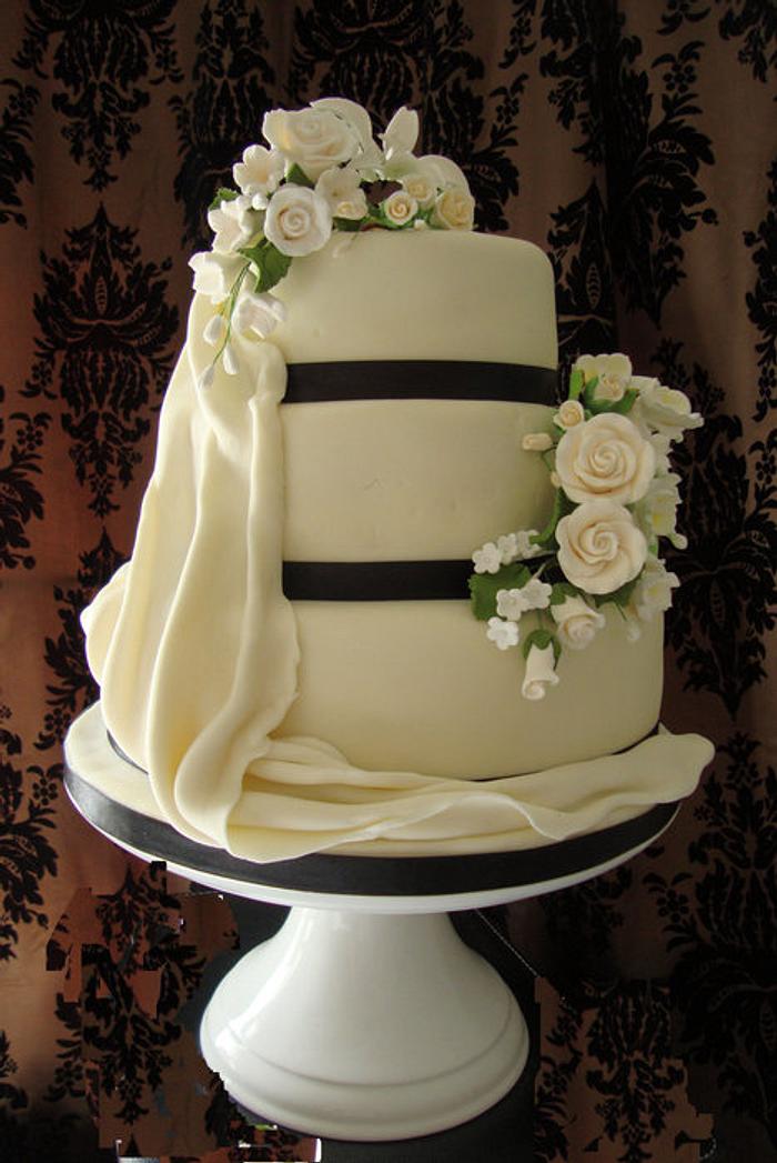 3 Tier Wedding Cake with Sugar Drape and Sugar Bouquets