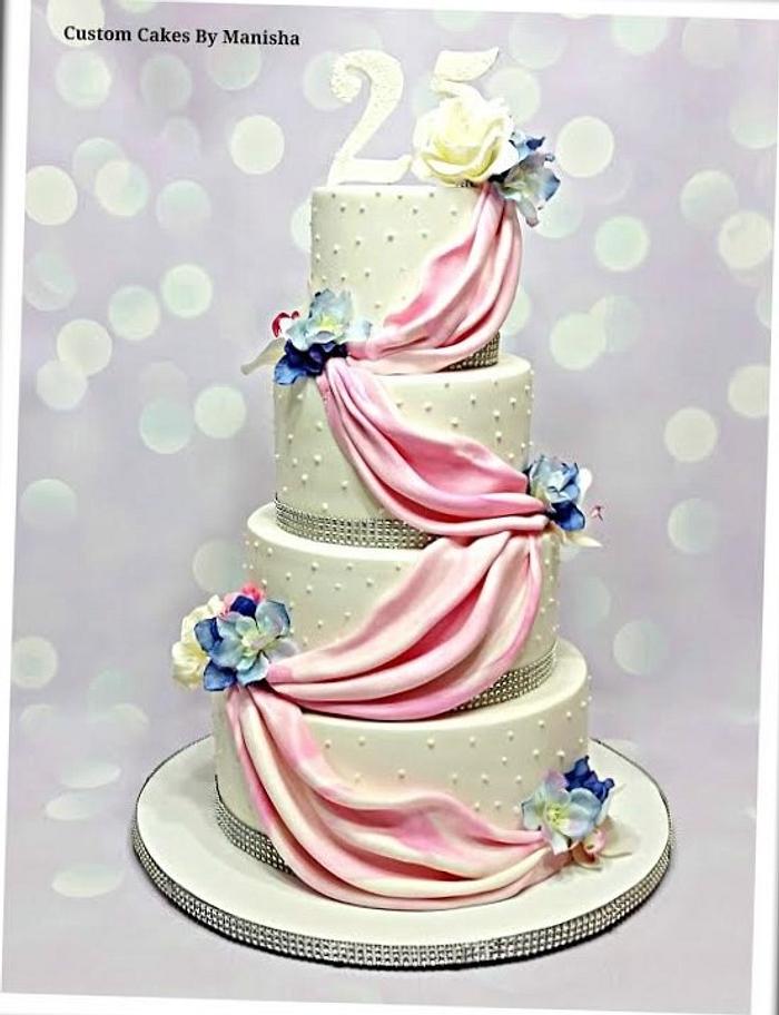 25th wedding anniversary cake dressed up in drapery!