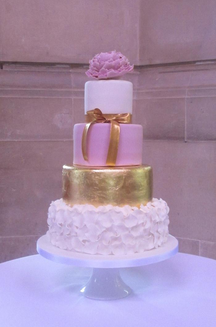 Four tiered gold leaf & ruffle Wedding Cake
