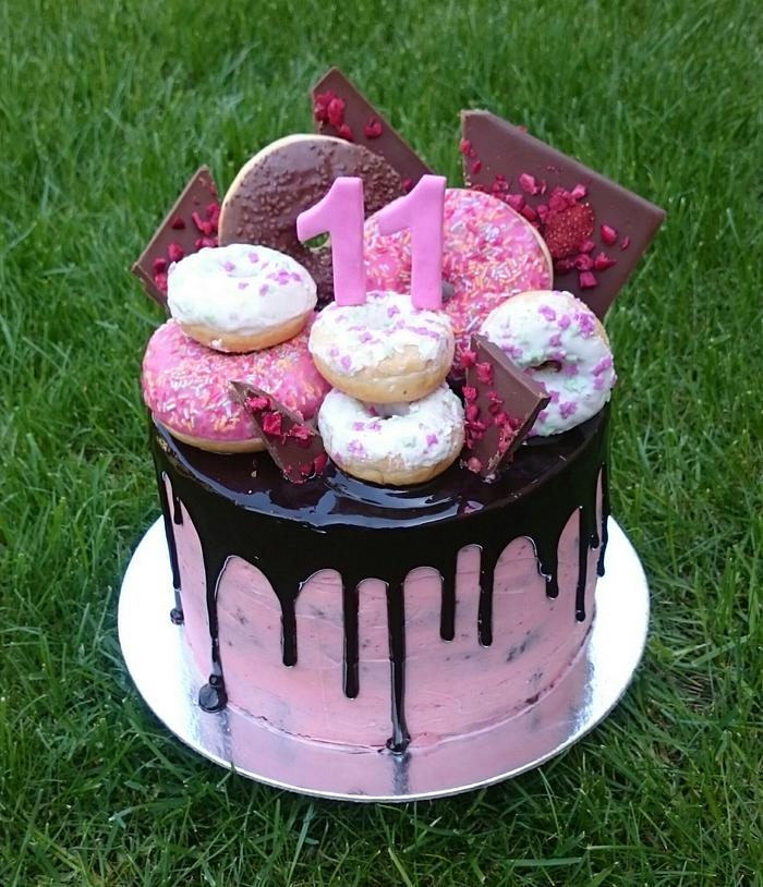 Chocolate cake with donuts