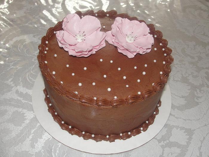 Open rose topper on Chocolate cake