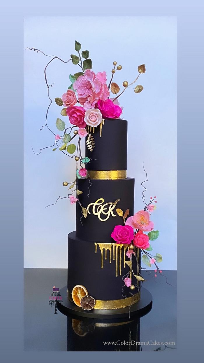 Black wedding cake with sugar flowers