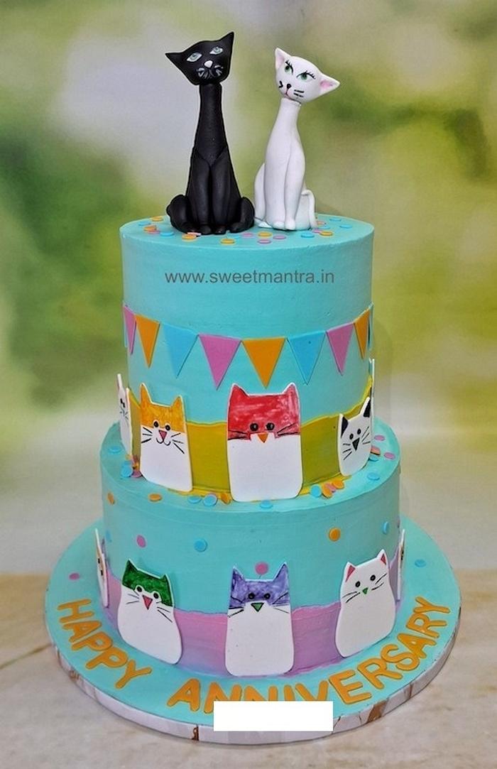 Cats theme 2 tier anniversary cake