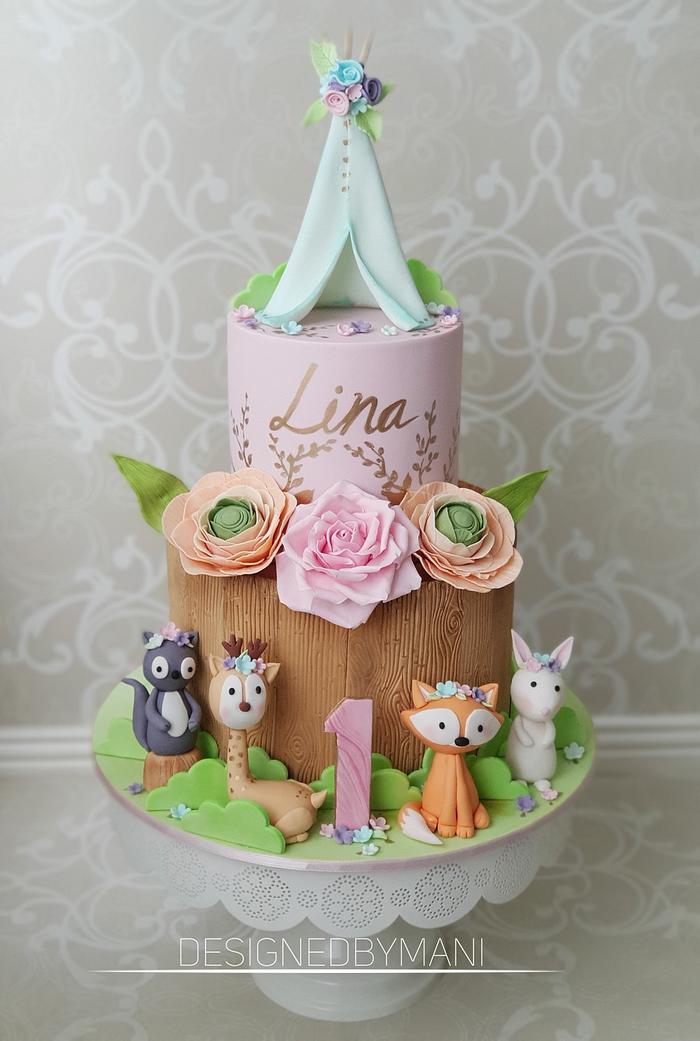 Whimsical Woodland 1st Birthday cake https://www.designedbymani.com/