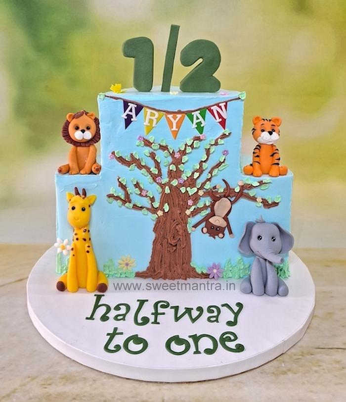 Animals theme half birthday cake