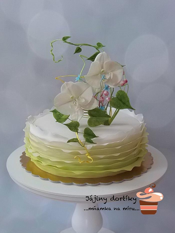 White Orchids and Ombré Ruffles Cake