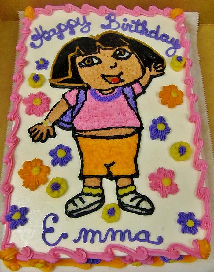Buttercream Dora Explorer on sheet cake