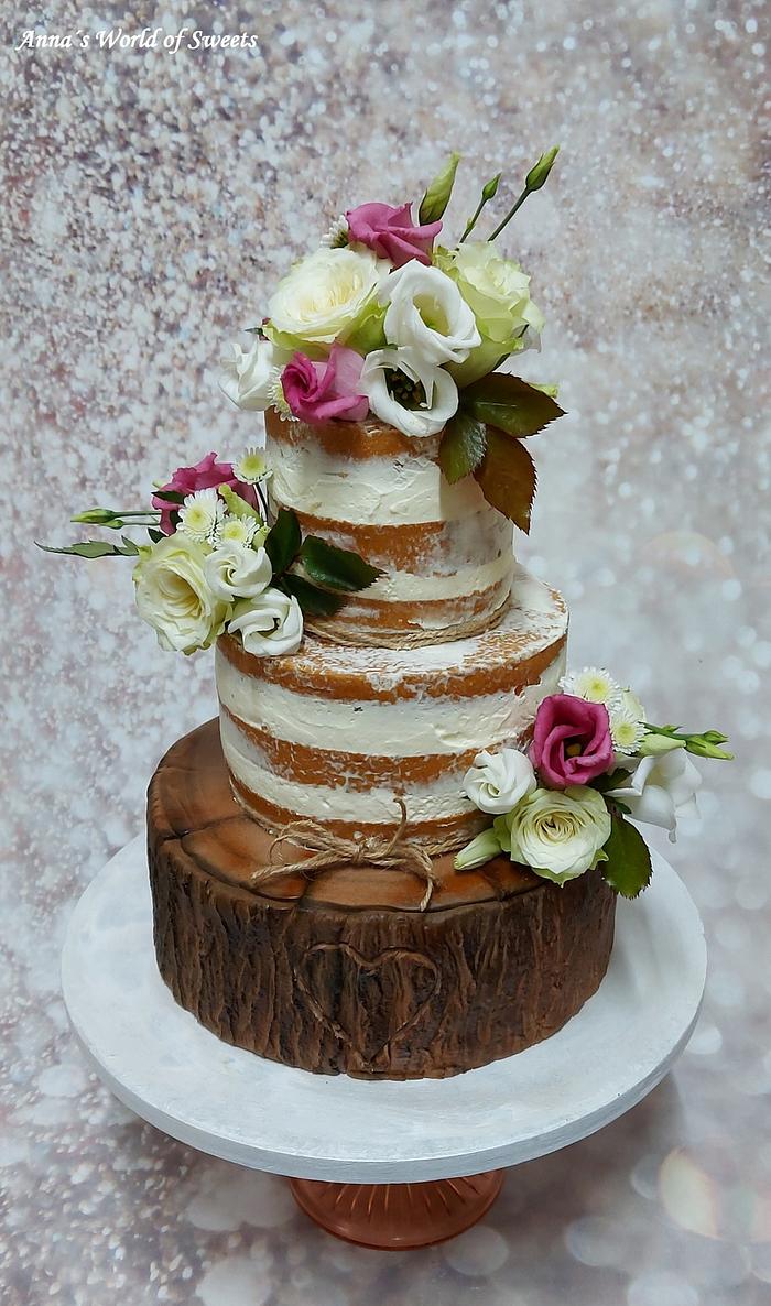 Log style wedding cake - Decorated Cake by Anna's World - CakesDecor