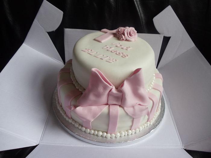 pink and white christening cake