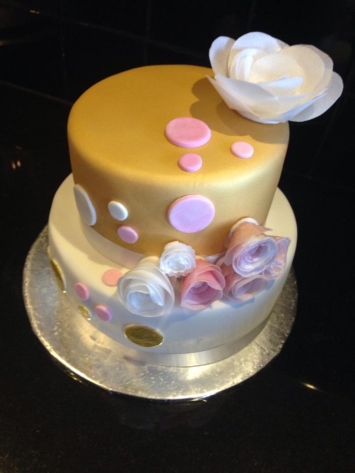 Two tiered Gold and Pink Cake