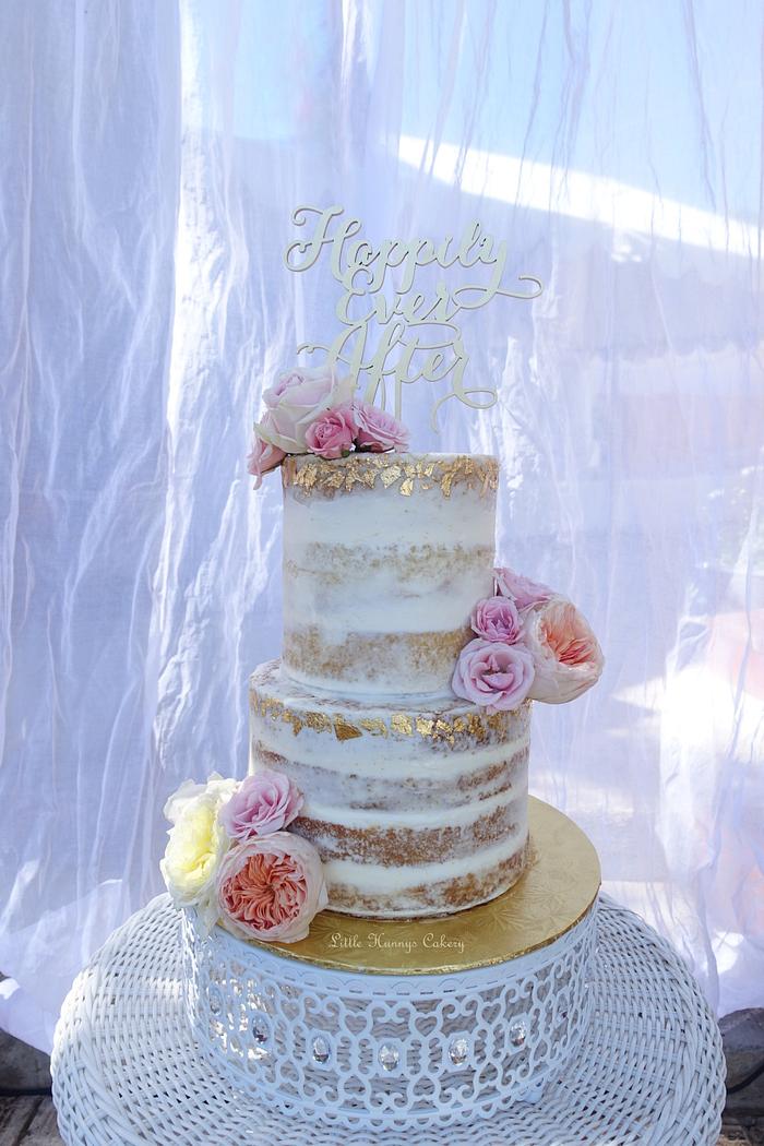 Naked cake with gold leaf