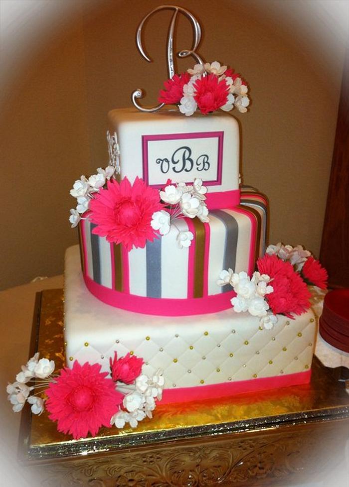 Pink, silver and gold wedding cake