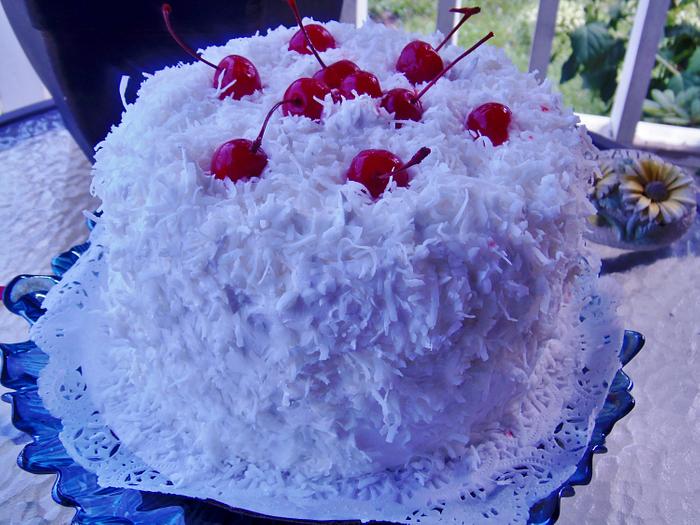Fresh coconut cake with pineapple filling 