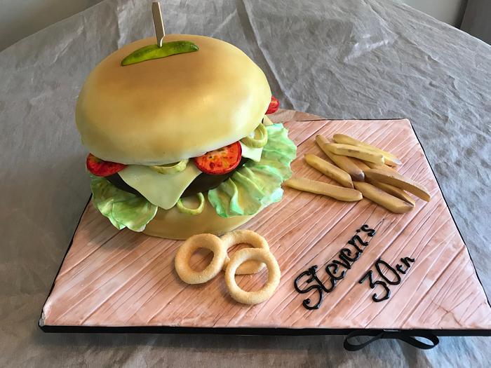 Burger Cake/ onion rings and fries
