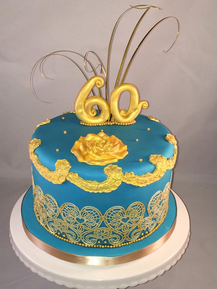 Turquoise and gold 60th birthday cake