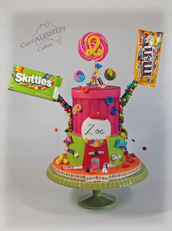 Gravity defying "ICING SMILES" candy shop cake