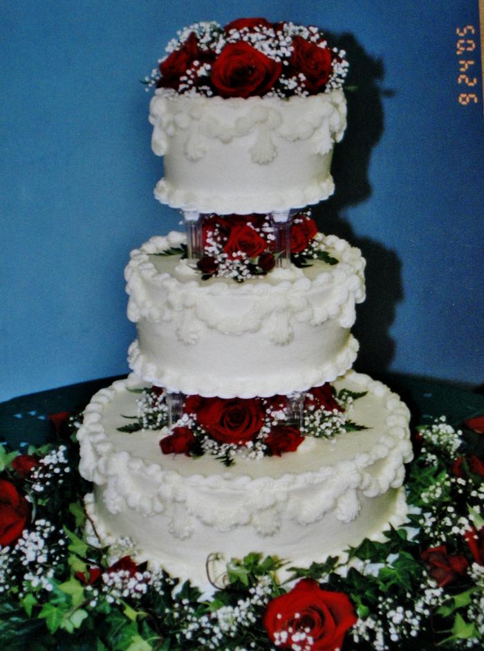 Buttercream rose and babies breath wedding cake
