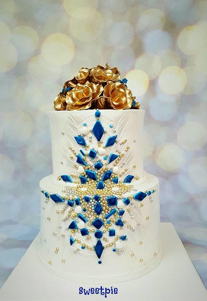 blue and gold wedding cake