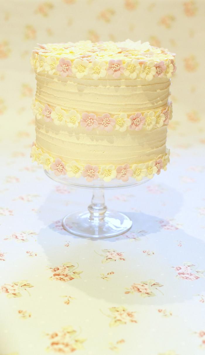 White chocolate buttercream blossom cake