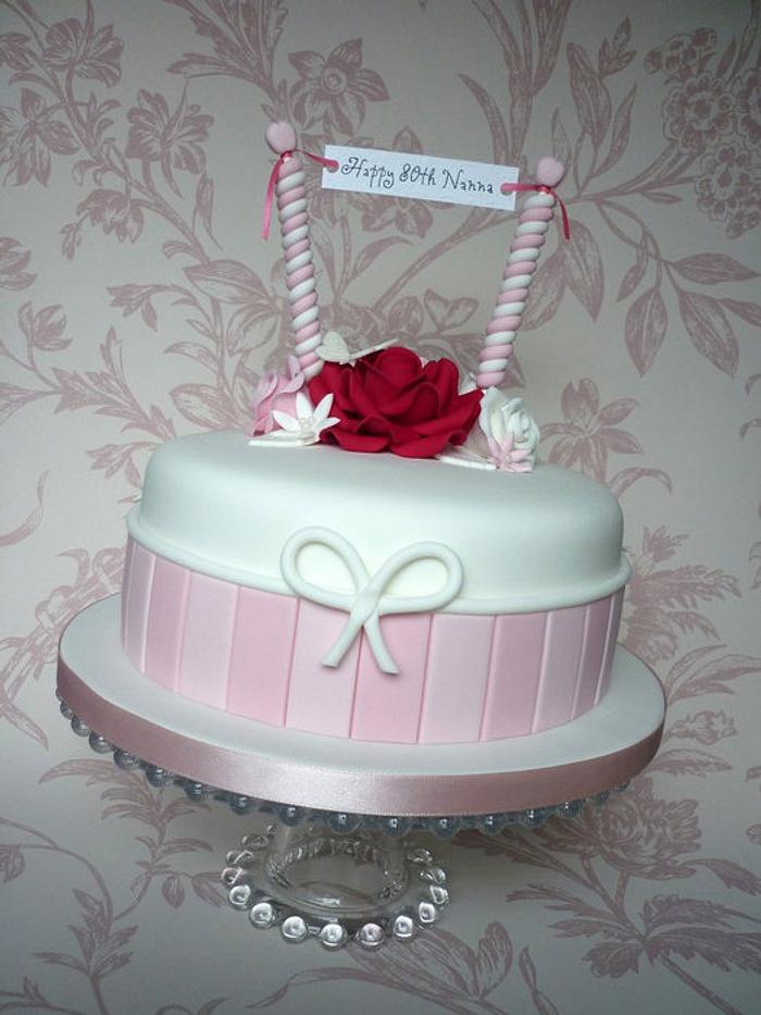 Pink, white & red 80th birthday cake