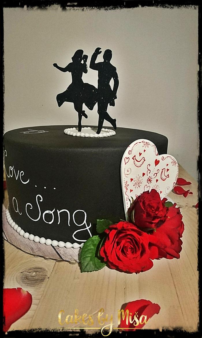 Black cake with swing dancers