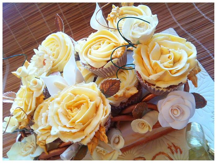 Golden birthday cake with hand made flowers