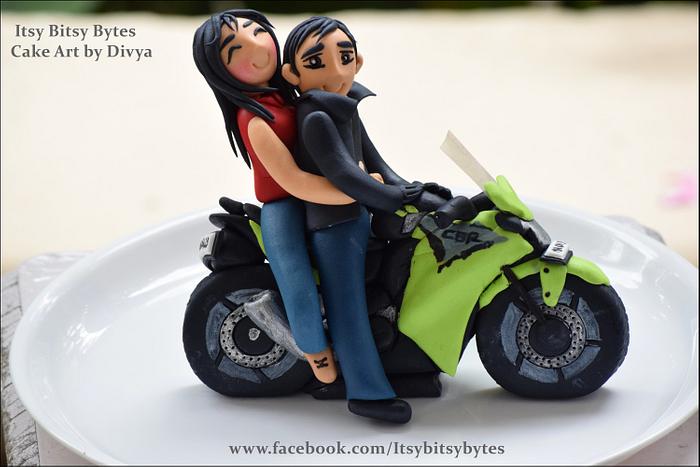 Couple on a bike cake