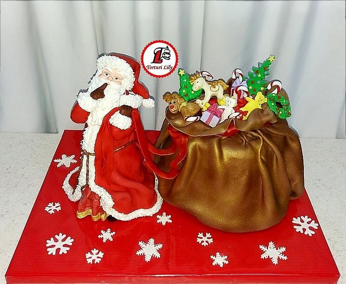 Santa Claus and his toy bag cake